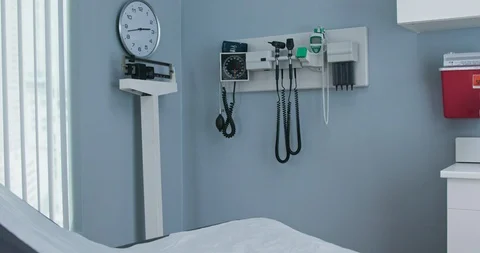 Panning shot of empty medical exam room in hospital or doctors office Stock Footage