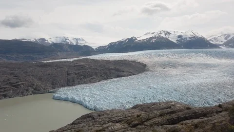 Panning shot of frozen bay surrounded by mountains, Patagonia, Chile Stock Footage 137967053