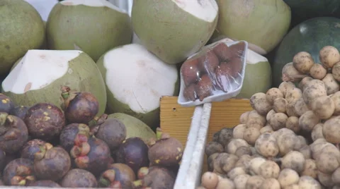 Panning shot of a fruit and vegetable market Stock Footage 68740675