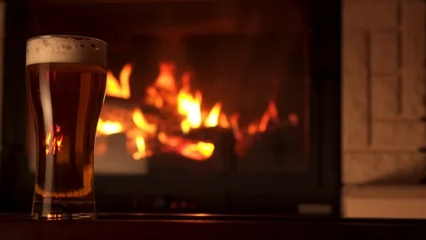 Panning shot full glass of appetizing cooled refreshment beer with foam Stock Footage 103549353
