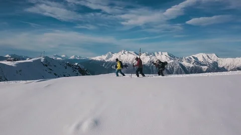 Panning shot group active hiker tourist wearing equipment climbing top mountain Stock Footage 120833441