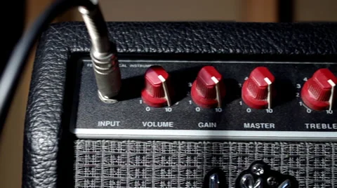 Panning shot of a guitar amplifier Stock Footage 29988701