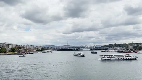 Panning Shot on the Halic Bridge with Dramatic Clouds Stock Footage 210133723