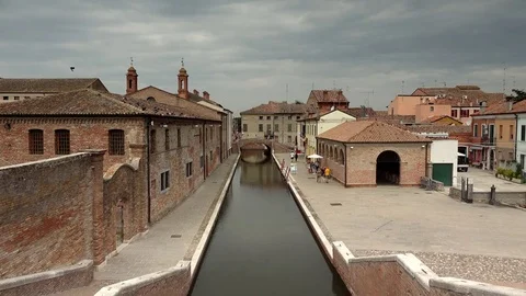 Panning shot of historical center of Comacchio ungraded Stock Footage