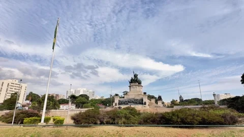 Panning Shot of Independence Monument and Brazilian Flag 스톡 동영상 334947223
