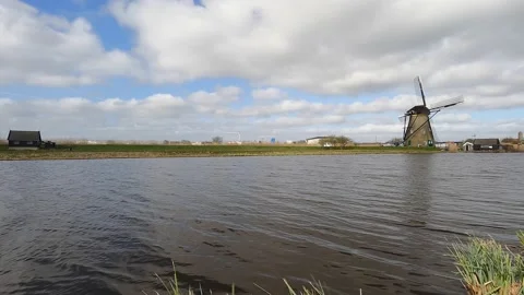 Panning shot of Kinderdijk WIndmills Stock Footage 151987353
