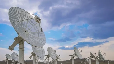 Panning shot of Large Satelite Dishes Telescope Array,China - Space Science Stock Footage