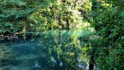Panning shot of mesmerizing landscape with waterfall Vídeo Stock 120427217