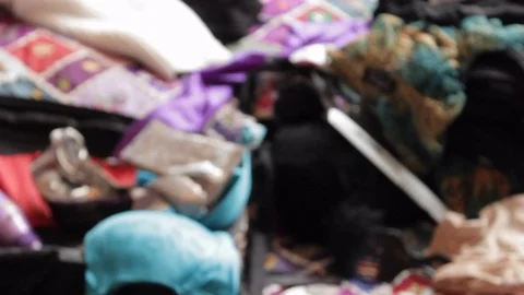 Panning shot of messy suitcase lying on the hotel room floor Stock-Footage 107621139
