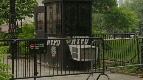 Panning shot of NYPD security checkpoint mayors office City Hall Stock Footage 345723299