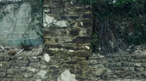 Panning Shot of an Old Wall at an Abandoned Factory Stock Footage 62867945