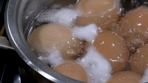 Panning shot over boiling eggs Stock-Footage 88256732