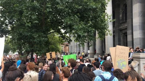 Panning shot over crowd at climate change protest in Adelaide Video stock 122562033