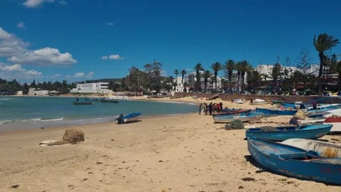 Panning shot over Hammamet’s beach, Tunisia, on a sunny spring morning Stock Footage 302454982