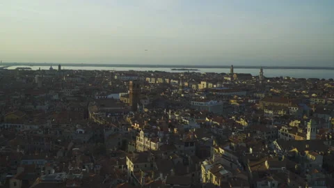 Panning shot over the rooftops of Venice during sunset, Italy, 4k Stock Footage 144685926