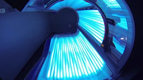 Panning Shot of A Powered On Tanning Bed Stock Footage 34755796