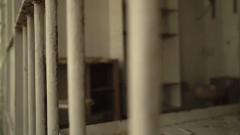 Panning Shot of Prison Jail Cell Vidéo 107697524