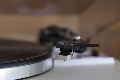 Panning shot of retro record player and record Stock Footage 113251383