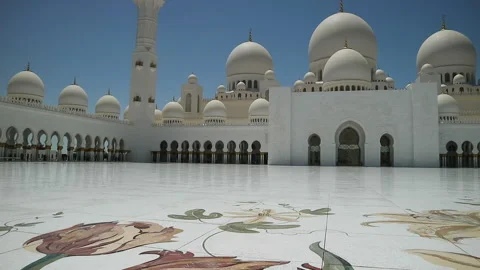 Panning Shot of Sheikh Zayed Grand Mosque Interior in Abu Dhabi Under Blue Sky Stock Footage 333820731