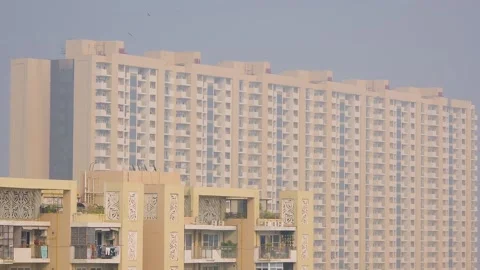 Panning shot showing multi storey buildings skyscrapers with buildings in the Stock Footage 331315049