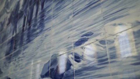 Panning shot of some iconic ceramic tiles (portuguese azulejos), inside of Stock Footage 269163089