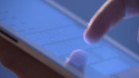 Panning Shot of Someone using a Tablet Stock Footage 48955845