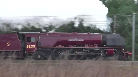 Panning shot of Stanier Pacific 6233 'Duchess of Sutherland'. Stock Footage 155020134