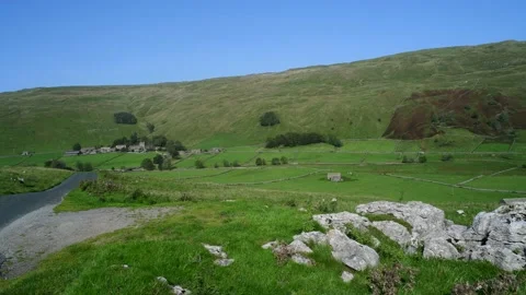 Panning shot summer time above Halton Gill Littondale UK Stock Footage 142128778