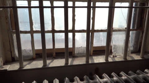 Panning Shot of Sunlit Prison Window 스톡 동영상 22606347