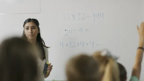 Panning shot of teacher questioning students in math class ,Provo, Utah, United Stock Footage 85911463