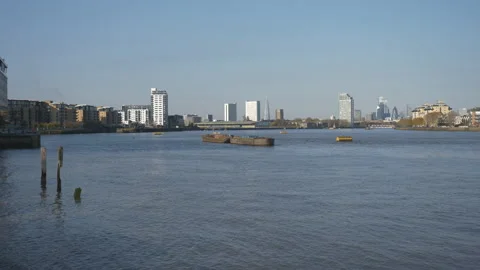A panning shot of the Thames river in Central London. Stock Footage 134211670