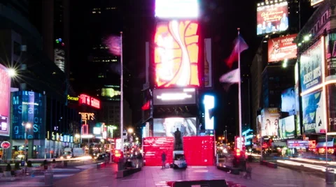 Panning shot of Time lapse in Times Square with people walking around the plaza. Stock Footage 54100551