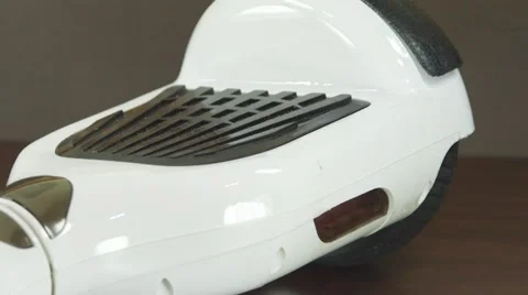 Panning shot of a two wheel electric self balancing scooter 動画素材 57326548