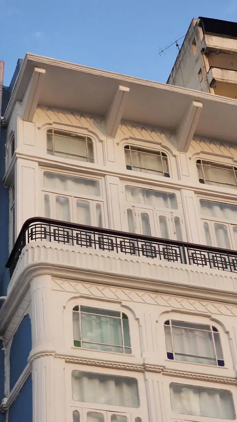 A panning shot of the upper portion of the bay window and roofline Stock Footage 314209079