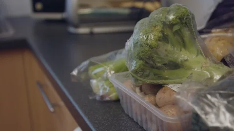 Panning Shot of Vegetables in Plastic Packaging Stock Footage