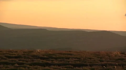 Panning sky and digging machine Stock Footage 8679318