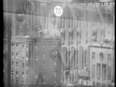 Panning up skyscrapers with superimposed  elevator buttons lighting up Stock Footage 260251060