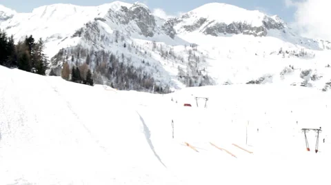 Panning of snow-covered ski slopes Stock Footage 61876225