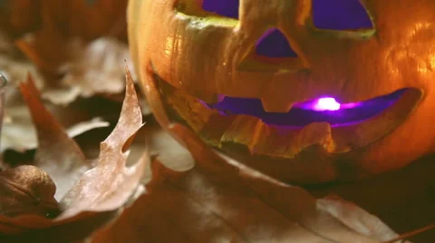 Panning of a staged halloween set of light pumpkin Stock-Footage 55845436