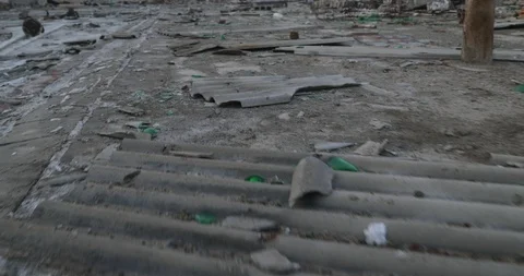 Panning from street texture to panoramic view of demolished city landscape. Видео 126308836