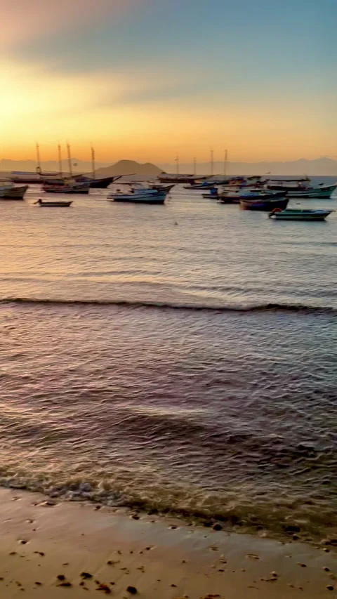 Panning at sunset in the bay of Buzios Stock Footage 306945602
