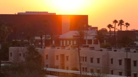 Panning Sunset Over the Skyline with Lens Flares Stock Footage 61839889