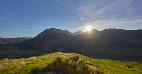 Panning Sunset Time Lapse of the Snowdon mountains range, Wales, UK Stock Footage 239135279
