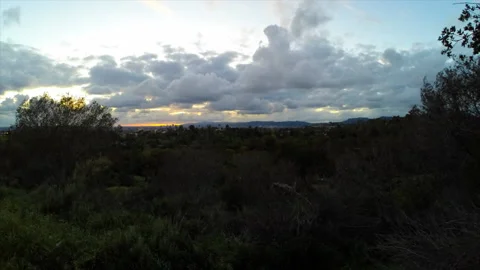 Panning Time Lapse Beautiful View Of Forest On Mountains In City At Sunset - Los Stock Footage 206320075