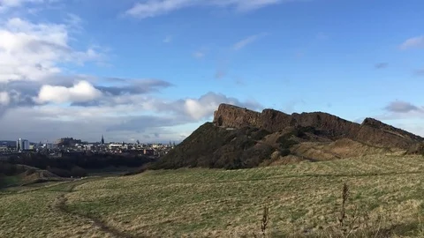 Panning time lapse of Edinburgh's Salisbury Crag at the Arthur's Seat. Stock Footage 72790466