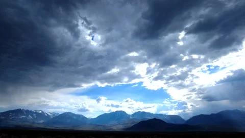 Panning time lapse of gathering storm clouds then downpour 스톡 동영상 166416517