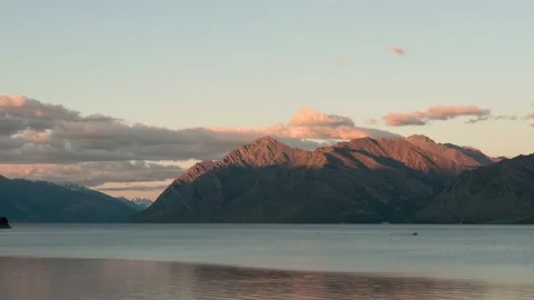 Panning time-lapse of Lake Hawea just at sunset, New Zealand. Stock Footage 146499153