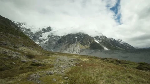 Panning time-lapse of Mount Sefton in Aorangi/Mount Cook NP, New Zealand. Video stock 145828990