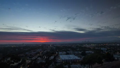Panning Time Lapse Scenic View Of City Seen From Mountain Under Clouds From Dusk Видео 236993428