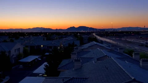Panning time-lapse shot of Las Vegas sunrise with lens flare Stock Footage 52324123